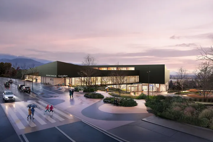 Community centre at dusk: Street-front arrival at dusk, with the plaza and landscaped approach. (City of Coquitlam rendering)