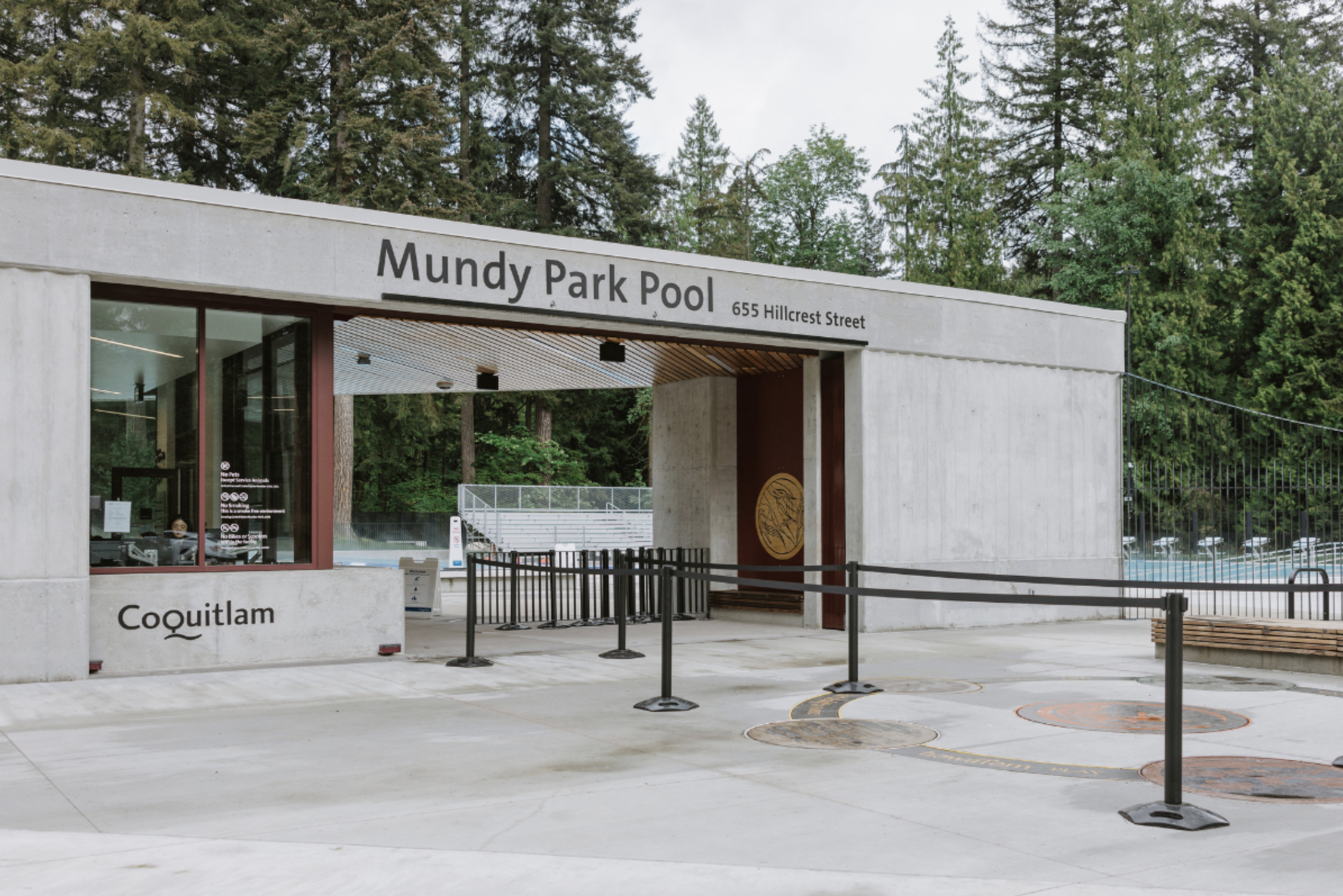 Mundy Park Outdoor Pool &mdash; the renewed leisure pool with beach entry and lazy river at the edge of the forest in Coquitlam, BC.