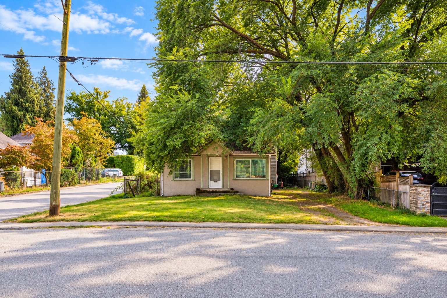 Street view of 13090 111 Avenue, North Surrey, from across 111 Avenue