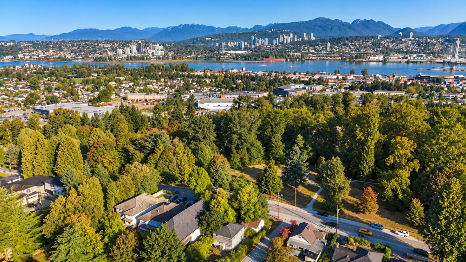 Aerial view north from Whalley toward the Fraser River and the North Shore mountains